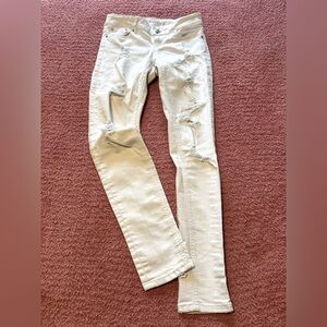 Ardene Distressed Cream Skinny Jeans